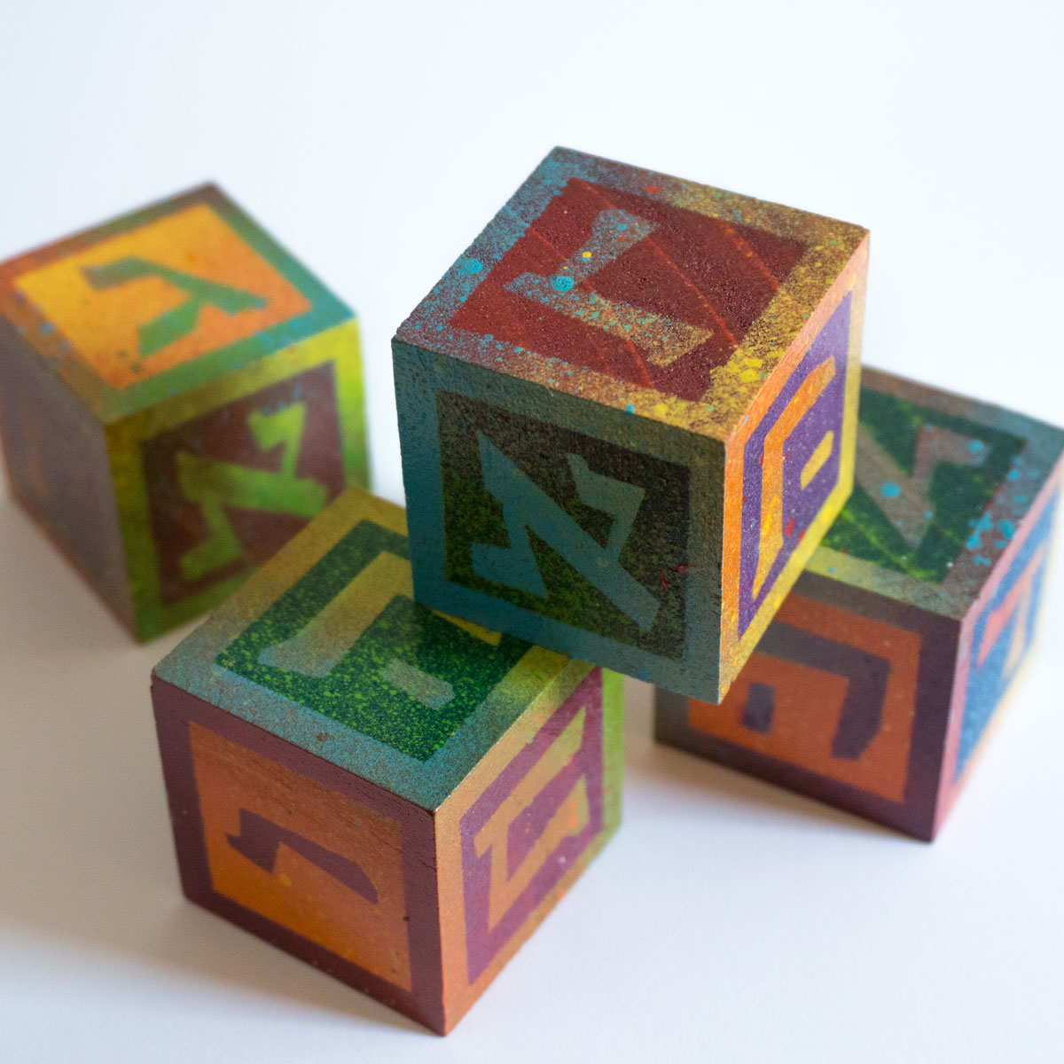 Spray paint Hebrew alphabet blocks